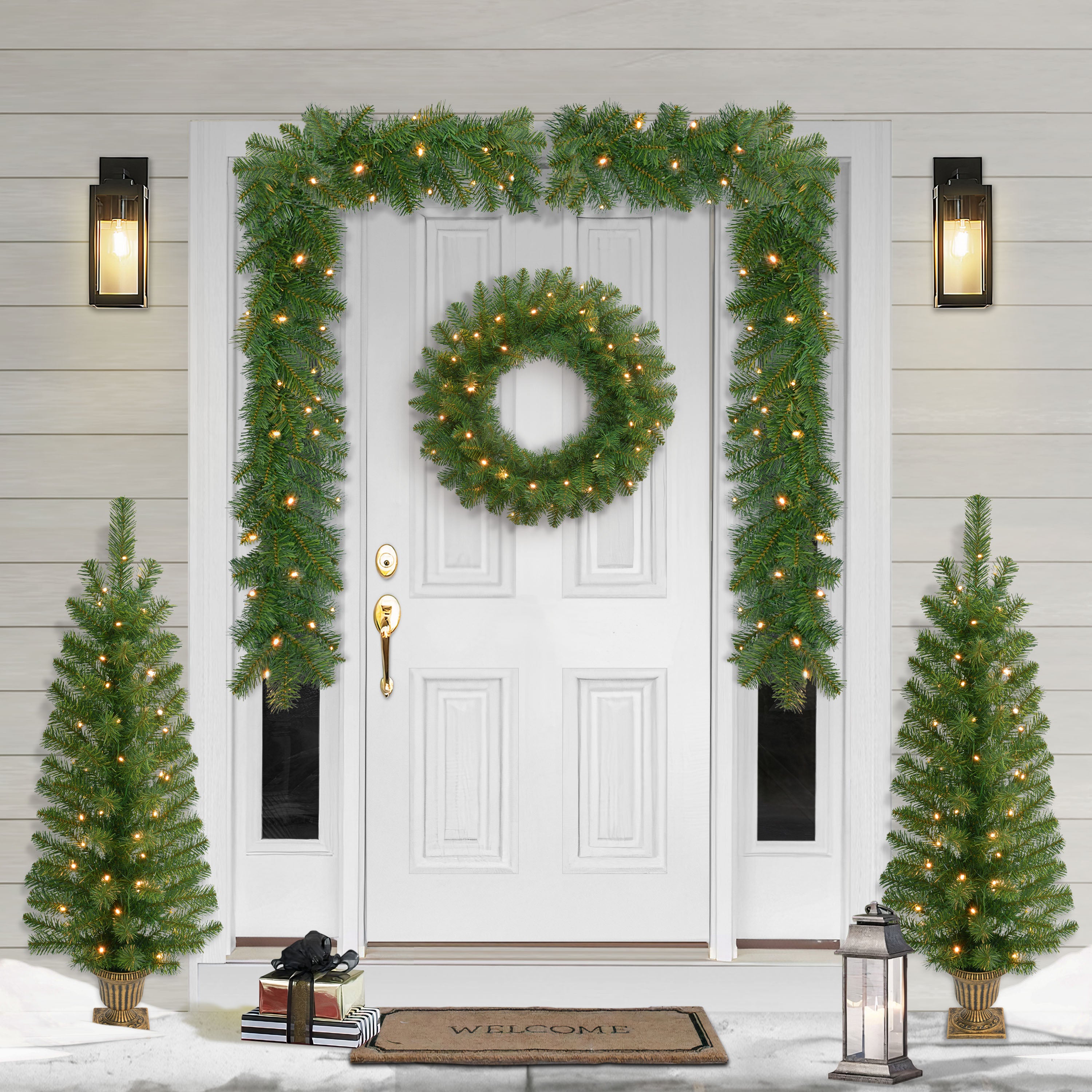 5-Piece Pre-Lit Christmas Décor Set Featuring 2 Trees, 1 Wreath, and 2 Garland